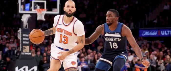 Fournier (13) dribbles during the Knicks' preseason tilt vs Minnesota